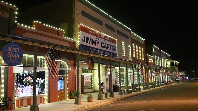 Downtown Plains is all lit up for President Carter and for the family, Tuesday, Feb. 21, 2023, in Plains, GA. (Hyosub Shin / Hyosub.Shin@ajc.com)