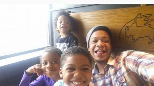 Daniel Wise, 31, was shot and killed Saturday during a custody exchange. He is pictured with his three children.