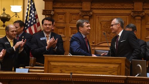 University of Georgia head football coach Kirby Smart is greeted by Lt. Gov. Casey Cagle, right, before briefly speaking in the Georgia Senate. Smart also spoke in the House during his Tuesday visit to the Capitol. Brant Sanderlin, bsanderlin@ajc.com