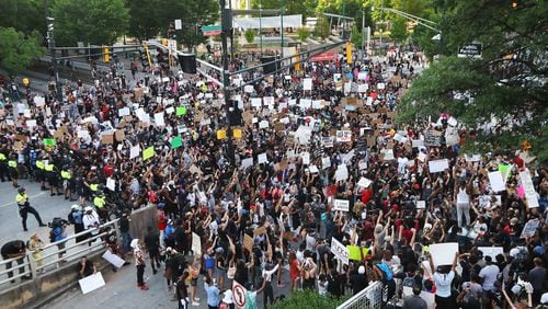 Thousands of protesters fill Marietta Street at Centennial Olympic Park Drive outside the CNN Center at Olympic Park during a fifth day of protests over the death of George Floyd (Curtis Compton ccompton@ajc.com)