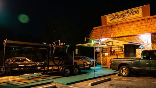 The famous smoking gun outside of the Rusty Nail on Buford Highway. / CONTRIBUTED BY HENRI HOLLIS