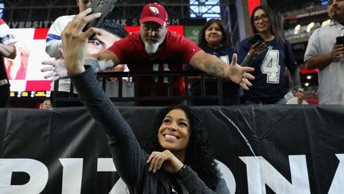 GLENDALE, AZ - SEPTEMBER 25: Singer Jordin Sparks takes a selfie with a fan before the start of the NFL game between the Arizona Cardinals and the Dallas Cowboys at the University of Phoenix Stadium on September 25, 2017 in Glendale, Arizona. (Photo by Christian Petersen/Getty Images)