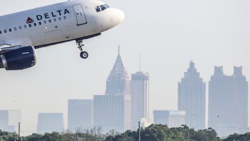 April 27, 2021 Hartsfield-Jackson Airport: Delta Air Lines has turned a corner as it starts filling middle seats again May 1, 2021 and looks for a travel rebound this summer. Average airfares hit a 25-year low in 2020 as the number of travelers on U.S. airlines dropped dramatically because of the pandemic, according to a federal report. Hartsfield-Jackson International Airport also had ranking changes in 2020. Guangzhou Bai Yun International Airport unseated the Atlanta airport for the first time in more than two decades, according to Airports Council International's preliminary world airport traffic rankings. Seven of the 10 busiest airports in the world in the pandemic year of 2020 were in China. However, Hartsfield-Jackson was the busiest  airport measured by flight counts in 2020, taking that title back from Chicago O'Hare. (John Spink / John.Spink@ajc.com)

