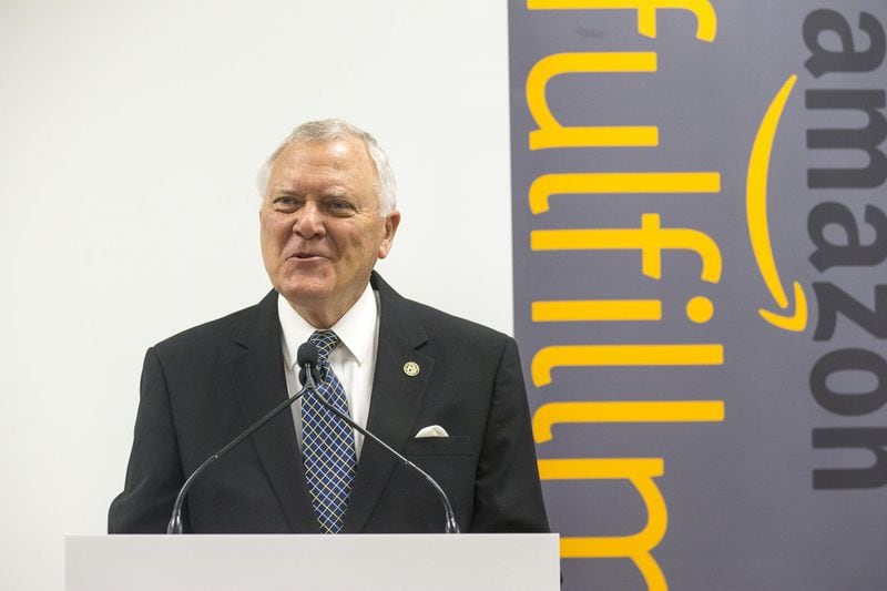 Gov. Nathan Deal speaks during a press conference Friday at the 1-year-old Amazon Fulfillment Center in Jefferson. State officials used the event to try charming Amazon executives, hoping to improve Georgia’s chances of landing Amazon’s “HQ2,” a $5 billion proposal that promises as many as 50,000 high-paying jobs. Metro Atlanta is on a shortlist of 20 candidates. (ALYSSA POINTER/ALYSSA.POINTER@AJC.COM)