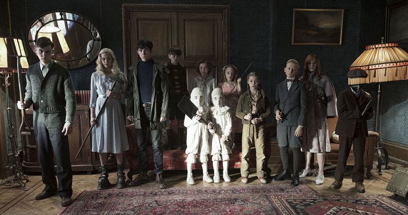 The residents of “Miss Peregrine’s Home for Peculiar Children” ready themselves for an epic battle against powerful and dark forces. Left to right: Enoch (Finlay Macmillan), Emma (Ella Purnell), Jake (Asa Butterfield), Hugh (Milo Parker), Bronwyn (Pixie Davies), the twins (Thomas and Joseph Odwell), Claire (Raffiella Chapman), Fiona (Georgia Pemberton), Horace (Hayden Keeler-Stone), Olive (Lauren McCrostie), and Millard (Cameron King). Jay Maidment