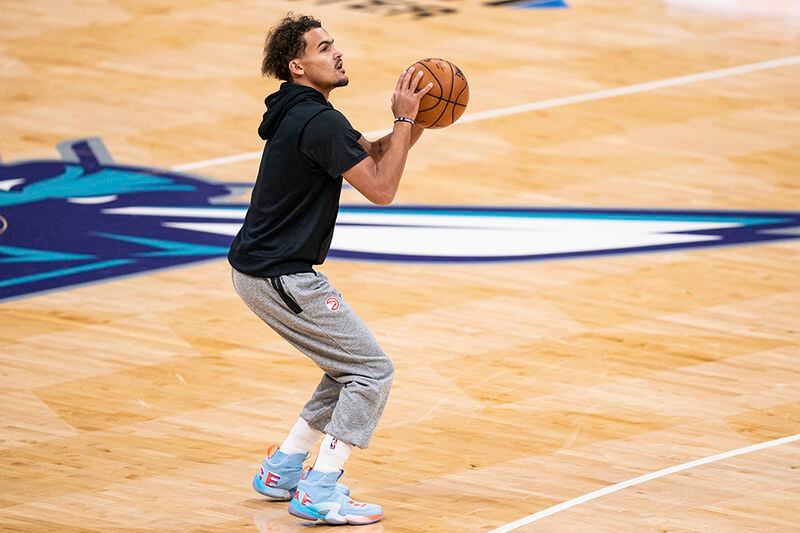 Atlanta Hawks guard Trae Young warms up for the team's game against the Charlotte Hornets Saturday, Jan. 9, 2021, in Charlotte, N.C. (Jacob Kupferman/AP)