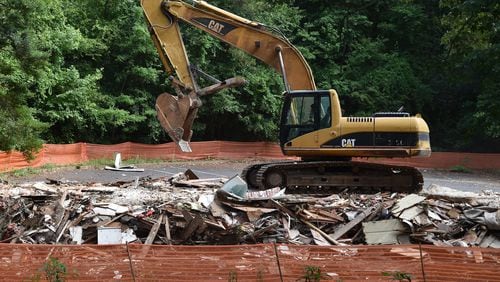 The South Cobb Redevelopment Authority tore down the The Magnolia Crossing Apartment Complex on Six Flags Drive in preparation for sale. (BRANT SANDERLIN/BSANDERLIN@AJC.COM)
