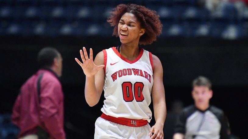 March 10, 2022 Macon - Woodward Academy's Sydney Bowles (0) gestures as she communicates with Woodward Academy's head coach Kim Lawrence (not pictured) during the 2022 GHSA State Basketball Class AAAAA Girls Championship game at the Macon Centreplex in Macon on Thursday, March 10, 2022. (Hyosub Shin / Hyosub.Shin@ajc.com)