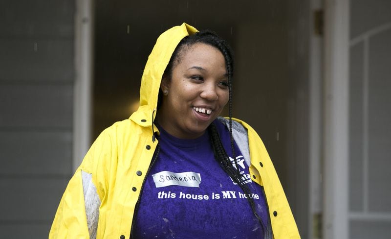 Santecia Bynum, 30, during a Habitat for Humanity build for her house on Parsons Street SW in the Ashview Heights neighborhood of Atlanta on Saturday, Jan. 19, 2019. Ashview Heights is one of the neighborhoods targeted for revitalization on Atlanta’s Westside. (Casey Sykes for The Atlanta Journal-Constitution)