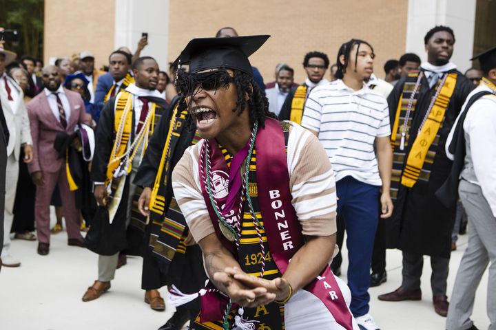 Members of Alpha Phi Alpha fraternity perform a step routine after the Morehouse College commencement ceremony on Sunday, May 21, 2023, on Century Campus in Atlanta. The graduation marked Morehouse College's 139th commencement program. CHRISTINA MATACOTTA FOR THE ATLANTA JOURNAL-CONSTITUTION