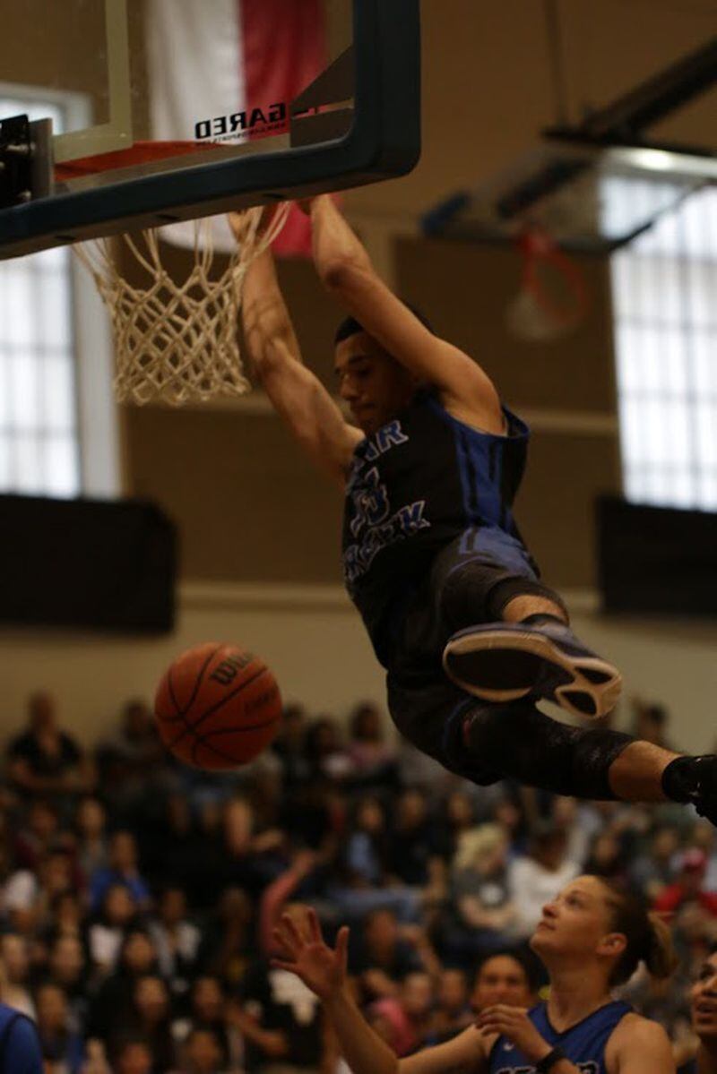 The author says he learned in basketball that he improved when he competed with better players. Is that a model for education to consider? A Cedar Creek High School senior dunks the ball during the school's annual faculty-student basketball game. CONTRIBUTED PHOTO MAY 1, 2015