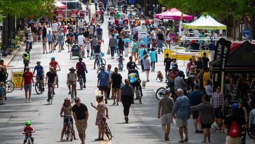 Crowds of people fill Peachtree Street during the Atlanta Streets Alive event Sunday, April 7, 2019. STEVE SCHAEFER / SPECIAL TO THE AJC