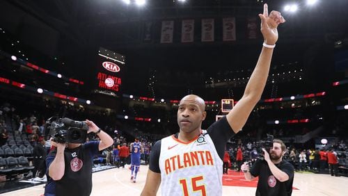 Atlanta Hawks guard Vince Carter, playing in what may be the final game of his career with the season being suspended by the NBA, thanks the fans when time expires after hitting a three pointer for the final shot of the game during a 136-131 overtime loss to the New York Knicks in a NBA basketball game on Wednesday, March 11, 2020, in Atlanta.   Curtis Compton ccompton@ajc.com