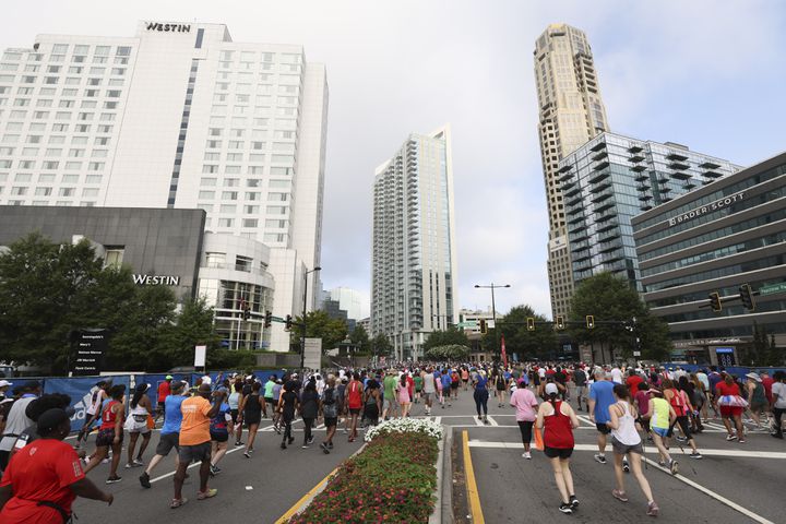 Runers in the 53rd running of the Atlanta Journal-Constitution Peachtree Road Race in Atlanta on Monday, July 4, 2022. (Jason Getz / Jason.Getz@ajc.com)