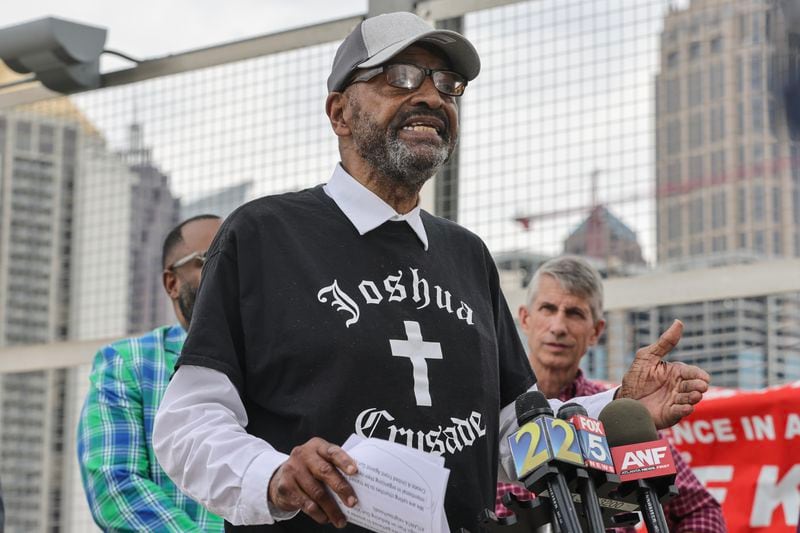 Pastor Richard Dalton speaks during a press conference held by faith leaders on 17th Street Bridge in Atlanta to address youth shootings in the city on Thursday, May 11, 2023. (Natrice Miller/natrice.miller@ajc.com). 