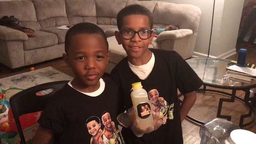 Ja'Den St. Hilaire (left), 7, and his brother Anthony Roberson, 10 are the owners of Brown Boys Lemonade. / Photo by Ligaya Figueras
