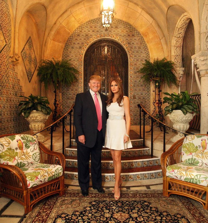 Photographed in 2011, President Donald Trump and first lady Melania Trump pose for a photo at Mar a Lago. Damon Higgins / The Palm Beach Post