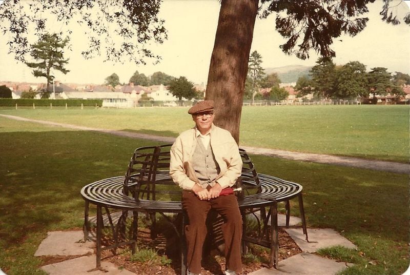 Bill King revisits Bailey Park in Abergavenny, Wales, in 1980. He had posed on a similar bench in the park 37 years earlier, while stationed in the town with the U.S. Army. (Courtesy of the King family)