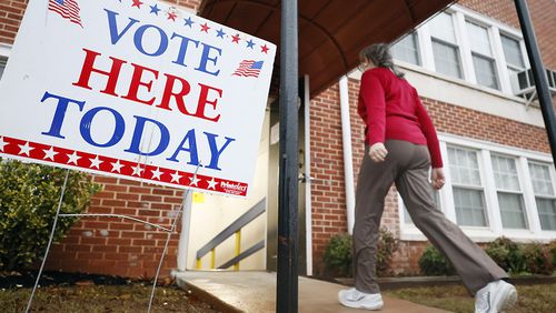 A person enters the Israel Baptist Church in Kirkwood during election day on Tuesday, December 6, 2022.
 Miguel Martinez / miguel.martinezjimenez@ajc.com