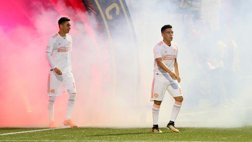 February 15, 2018.  Ezequiel Barco walks through the tunnel at the Atlanta United training facility in Marietta, Ga., Thursday, Feb. 15, 2018. Hundreds of fans cheered as the team showed their new secondary uniforms for the 2018 MLS season.