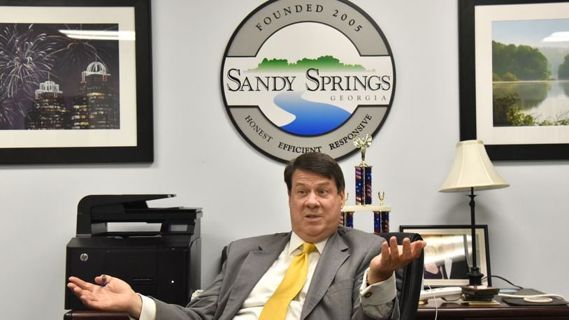 Mayor Rusty Paul ran unopposed and was re-elected to a second term in Sandy Springs, but the city will welcome two new members to its city council after Tuesday’s election.