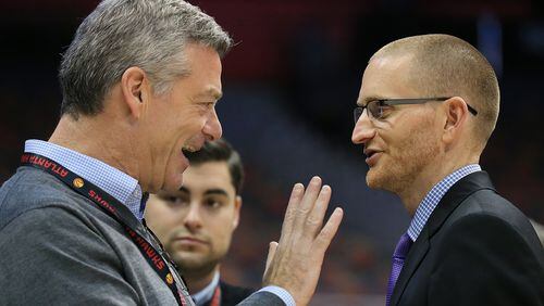 102715 ATLANTA: -- Hawks owner Tony Ressler (left) talks with general manager Wes Wilcox as the team prepares to play their first regular season basketball game "home opener" against the Pistons on Tuesday, Oct. 27, 2015, in Atlanta. Curtis Compton / ccompton@ajc.com
