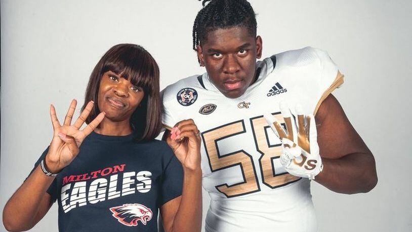 Milton High offensive lineman Brandon Best with his mother, Sharee, during a visit to Georgia Tech. After receiving a scholarship offer June 1, 2021, following an in-person on-campus workout, Best announced his commitment to Tech on June 21. (Photo courtesy of Brandon Best)