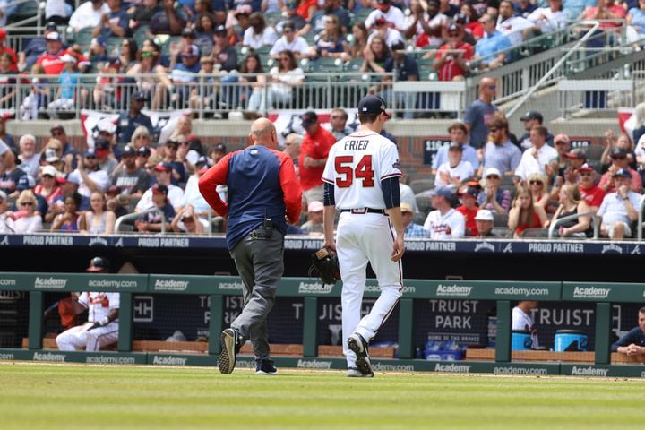 Braves pitcher Max Fried walks to the dugout after being replaced in the fifth inning Wednesday at Truist Park. (Miguel Martinez/miguel.martinezjimenez@ajc.com)