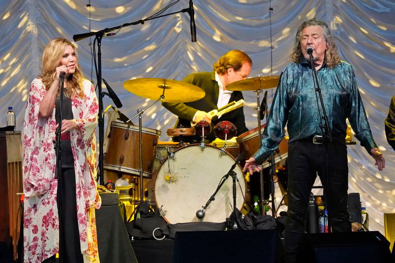 FILE - Robert Plant & Alison Krauss perform at the Jay Pritzker Pavilion, June 7, 2022, in Chicago. T Bone Burnett’s production of the “O Brother, Where Art Thou?” soundtrack and the “Raising Sands” collaboration between Krauss and Plant are celebrated and responsible for many of his 13 Grammy Awards. (Photo by Rob Grabowski/Invision/AP, File)
