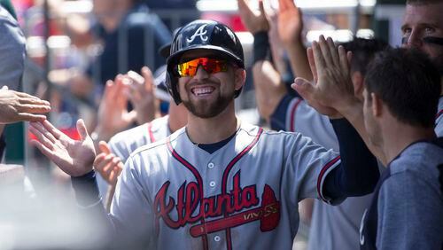 Ender Inciarte went 5-for-5 with a triple, a walk and four RBIs in the Braves’ 9-1 win Wednesday at Philadelphia. Here he’s congratulated after scoring the first run of the game in the first inning. (Photo by Mitchell Leff/Getty Images)