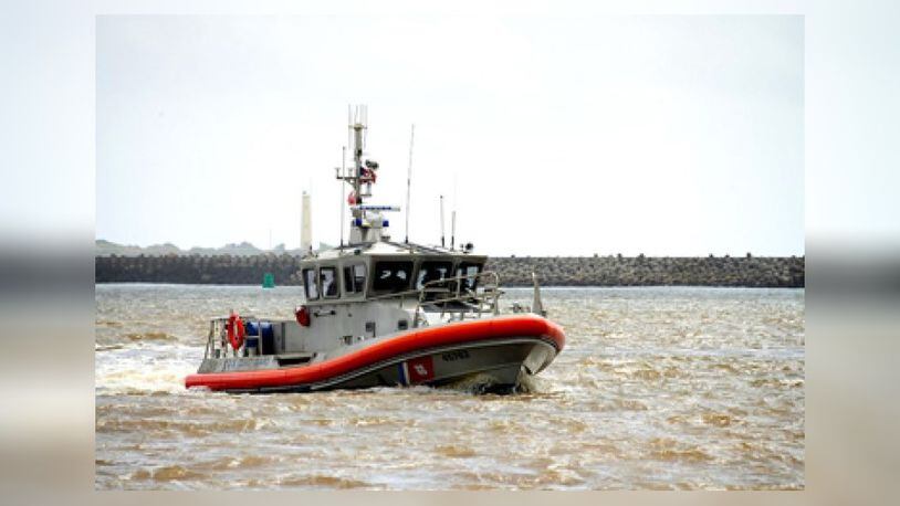 A medium-sized, 45-foot response boat like this one helped to pull two people from the water near Brunswick after their boat capsized Monday.