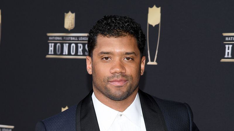 NFL player Russell Wilson reportedly gave each of the Seahawks’ 13 current offensive lineman $12,000 in Amazon stock.