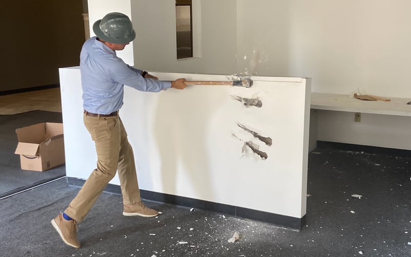 Kenny Wolfe, owner of Wolfe Investments, used a sledgehammer to formally kick off construction at the historic W.D. Grant Building in downtown Atlanta on Thursday, July 13, 2023.
