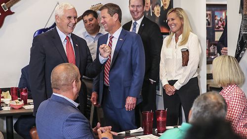Vice President Mike Pence (left), Gov. Brian Kemp (center) and  first lady Marty Kemp at the Star Cafe in Atlanta on Friday, May 22, 2020. (Photo: JOHN SPINK/JSPINK@AJC.COM)