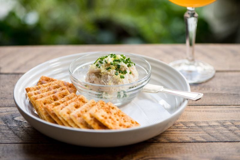 If you want to nibble while enjoying a cocktail at the Garden & Gun Club, the Smoked Fish Dip with Baked Saltines is one way to go. CONTRIBUTED BY MIA YAKEL