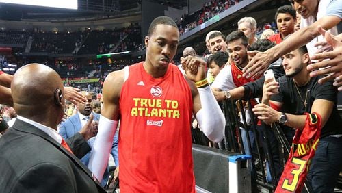 Hawks center Dwight Howard, who did not play in the fourth quarter, leaves the court after his team lost to the Washington Wizards 115-99 and was eliminated from the NBA playoffs Friday night. (Curtis Compton/ccompton@ajc.com)