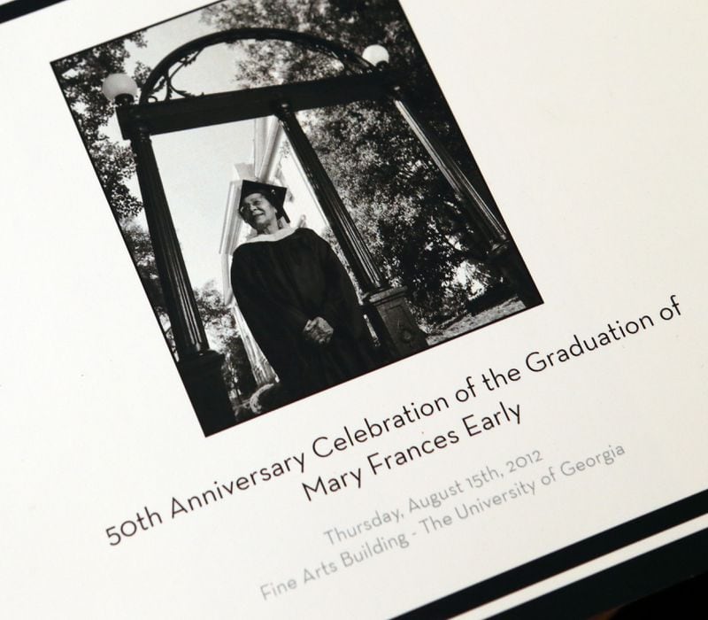 May 7, 2013-DECATUR: Copy of a book cover showing Mary Frances Early at the University of Georgia on the 50th anniversary of her graduation. Though she rarely is mentioned in the history books, Early is actually the first Black graduate of the University of Georgia, before Charlayne Hunter Gault and Hamilton Holmes. In 2013, UGA gave her an honorary doctor of laws degree to acknowledge this fact.(Phil Skinner / AJC FILE)