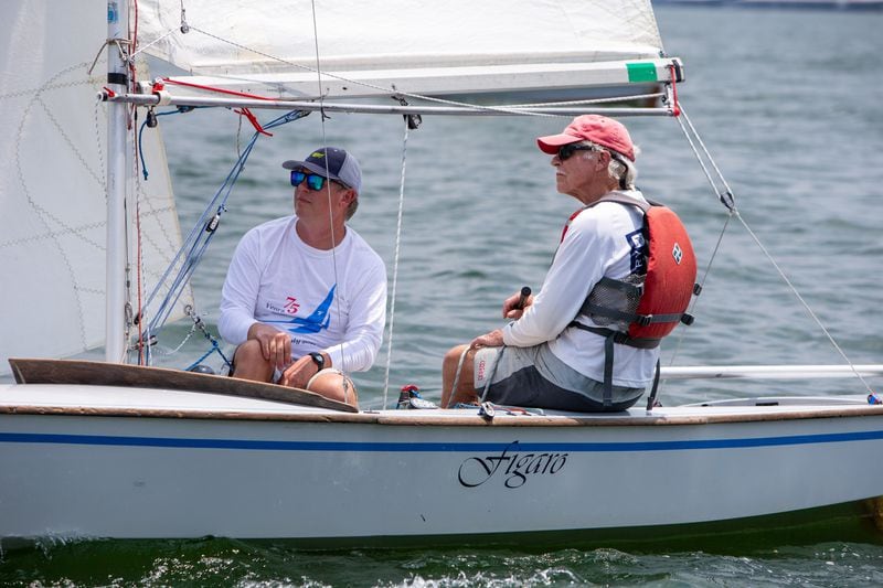 John Muhlhausen (right) and his son David get ready for a race on his Snipe sailboat for a race at the the Atlanta Yacht Club on Lake Allatoona. PHIL SKINNER FOR THE ATLANTA JOURNAL-CONSTITUTION.
