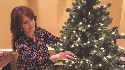 When Marietta blogger Robin Gay decorated one of four artificial holiday trees featured in rooms at The Inn on Biltmore Estate, she took care not to overwhelm her small tree. CONTRIBUTED BY ROBIN GAY
