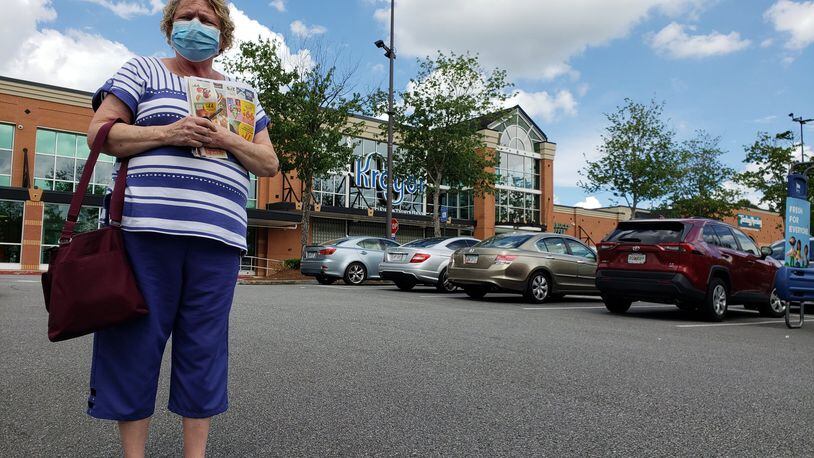 Becky Phillips wears a mask when she goes out to a north Fulton Kroger, convinced it will help protect others from the coronavirus. MATT KEMPNER / AJC