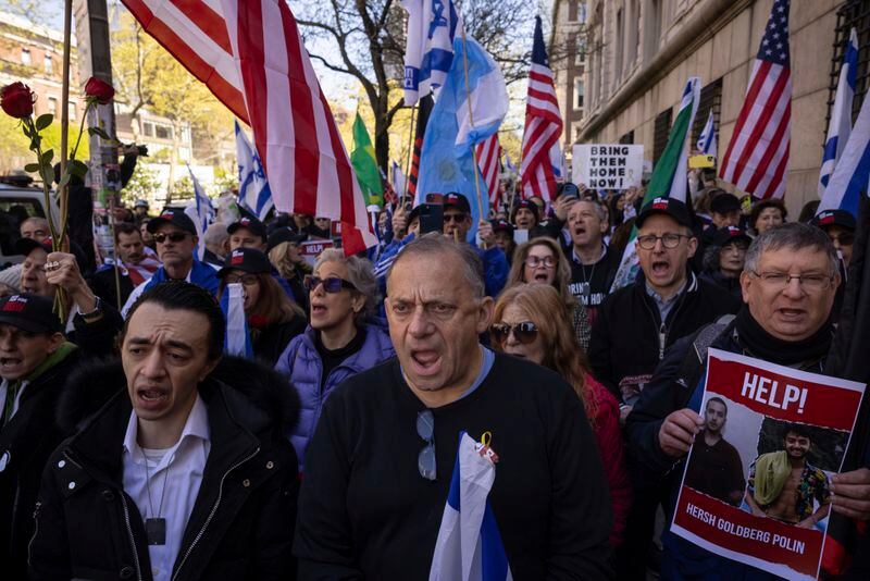 Pro-Israel demonstrators chant during the "Bring Them Home Now" rally outside the Columbia University , Friday, April 26, 2024, in New York. (AP Photo/Yuki Iwamura)