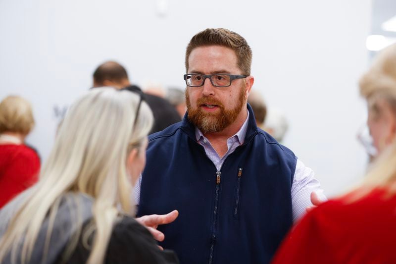 Mableton mayoral candidate Aaron Carman talks to residents following a town hall discussion about the process to de-annex from the city on Wednesday, January 18, 2023.  (Natrice Miller/natrice.miller@ajc.com) 