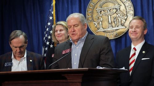Senator John Albers (from right), R - Roswell, Rep. Chuck Martin, R - Alpharetta, House Speaker Pro-Tempore Jan Jones, R - Milton, and Senator Fran Millar, R - Atlanta, at a press conference on the final passage of legislation addressing Fulton County tax exemptions. Though the state and county are making changes, the system will not be fixed this year. BOB ANDRES /BANDRES@AJC.COM AJC FILE PHOTO