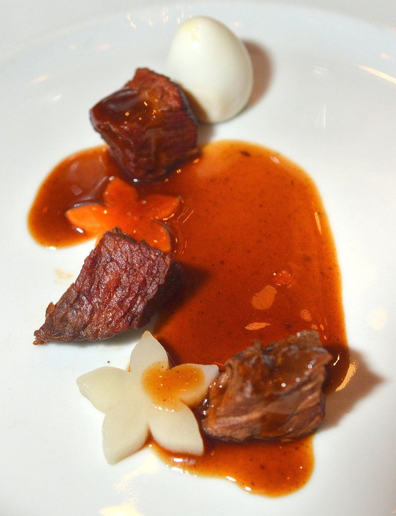 The braised beef short ribs (galbijjim) were “tender beyond any meat I could possibly fathom cooking at home, and deep with soy flavor,” writes Ligaya Figueras, the AJC senior editor of food and dining, who attended the gala celebration of the Korean harvest feast Chuseok, held Oct. 5, 2017, at the Westin Atlanta Perimeter North. (Chris Hunt/Special for The AJC)