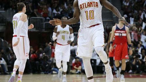 Hawks’ Tim Hardaway Jr. celebrates scoring against the Wizards during the fourth period in the home opener of their NBA basketball game at Philips Arena on Thursday, Oct. 27, 2016, in Atlanta. Curtis Compton /ccompton@ajc.com