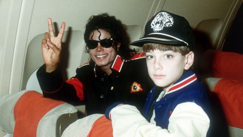 UNSPECIFIED - JULY 11: Michael Jackson with 10 year old Jimmy Suchcraft on the tour plane on 11th of July 1988.(Photo by Dave Hogan/Getty Images)