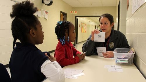 Roswell is applying for a $77,384 grant to support a reading program that has AmeriCorps members working with students after school.  CONTRIBUTED FILE PHOTO