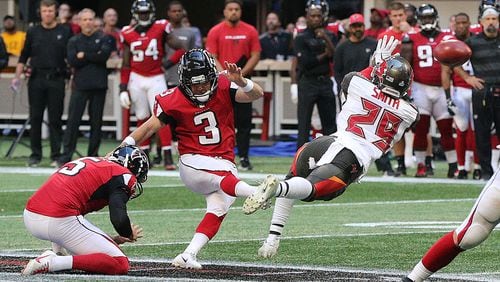 Atlanta Falcons kicker Matt Bryant just gets off the field goal for a 34-29 lead over the Tampa Bay Buccaneers during the final minute Sunday, Oct. 14, 2018, in Atlanta.