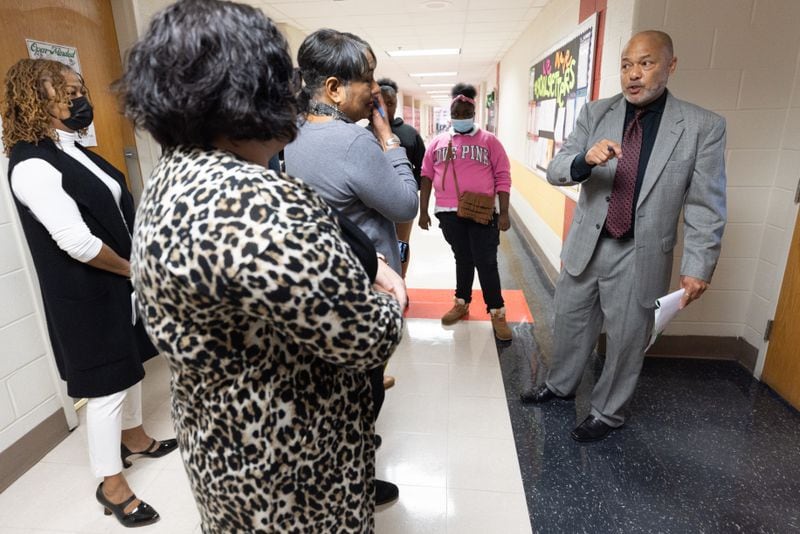 Jean Childs Young Middle School Principal Ron Garlington talks with school representatives from around the country about their approach to teaching students social and emotional skills on Wednesday, Dec. 7, 2022.  (Steve Schaefer/steve.schaefer@ajc.com)