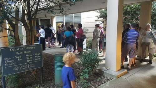 Hundreds lined up for free eclipse glasses at the Decatur public library Saturday. (Photo by me)